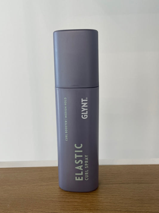 Elastic curl spray